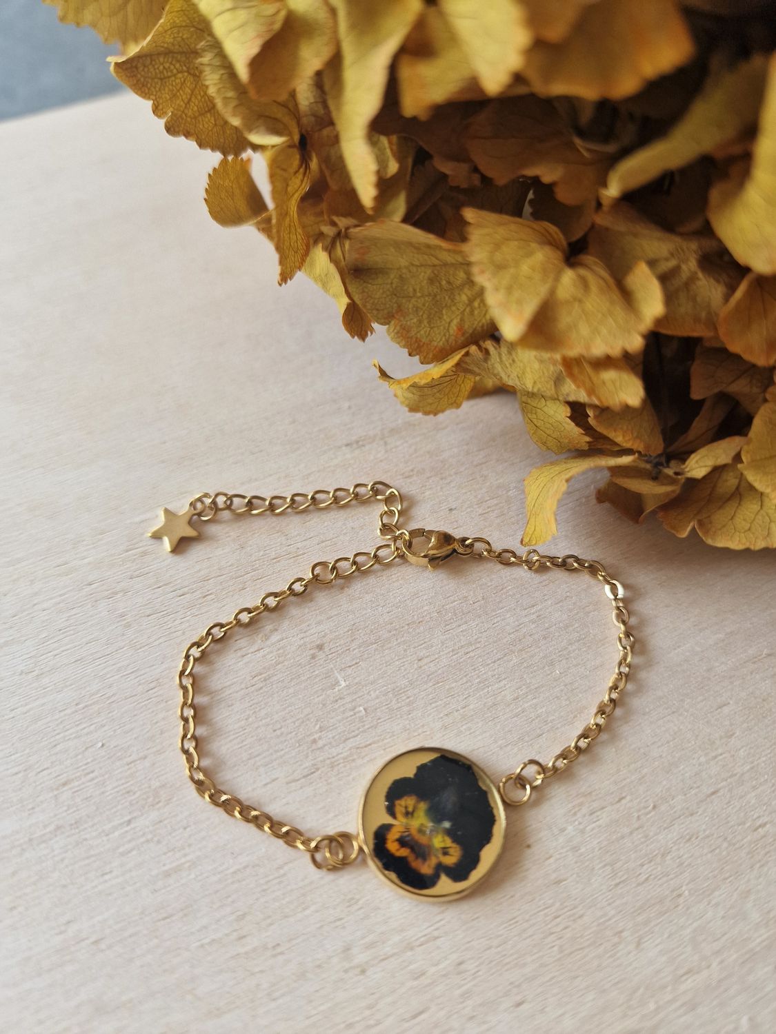 Bracciale dorato violetta viola