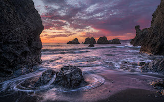 Jon Klein - Sunset at a Rocky Beach -Stretched Canvas Print - 31x47.5