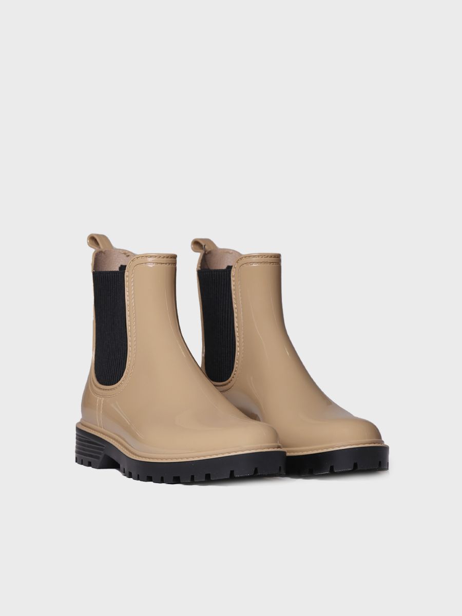 Bota de agua baja para mujer en goma en tonos brillantes CAVAN - beige