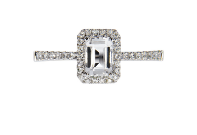 HARMONY diamond ring, made by 14 ct. white gold and 0,18 ct. TW/SI diamonds and 0,70 ct. baguette cut topaz