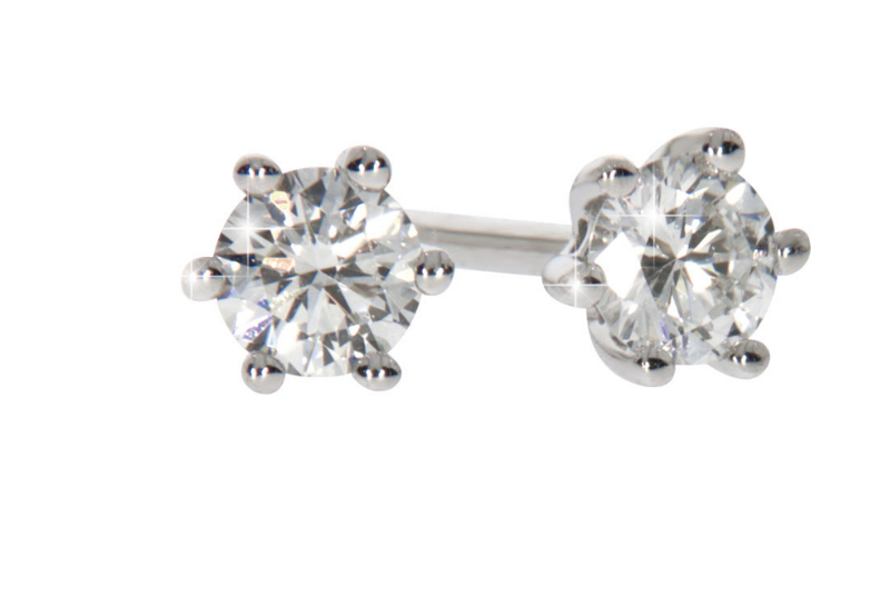 GRACE diamond earrings, made of 14 ct. white gold and 2 x 0,10 ct. TW/SI diamonds