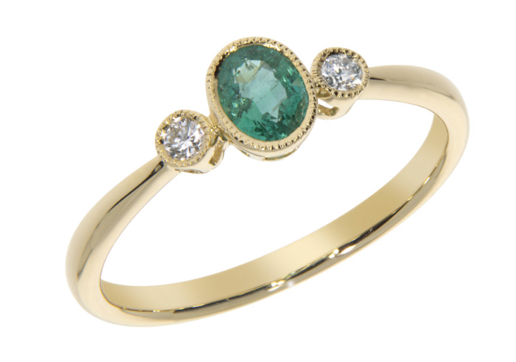 WILLOW ring, made of 14 ct. yellow gold, 0,07 ct. W/SI diamonds and oval 4x5mm./0,36 ct. emerald