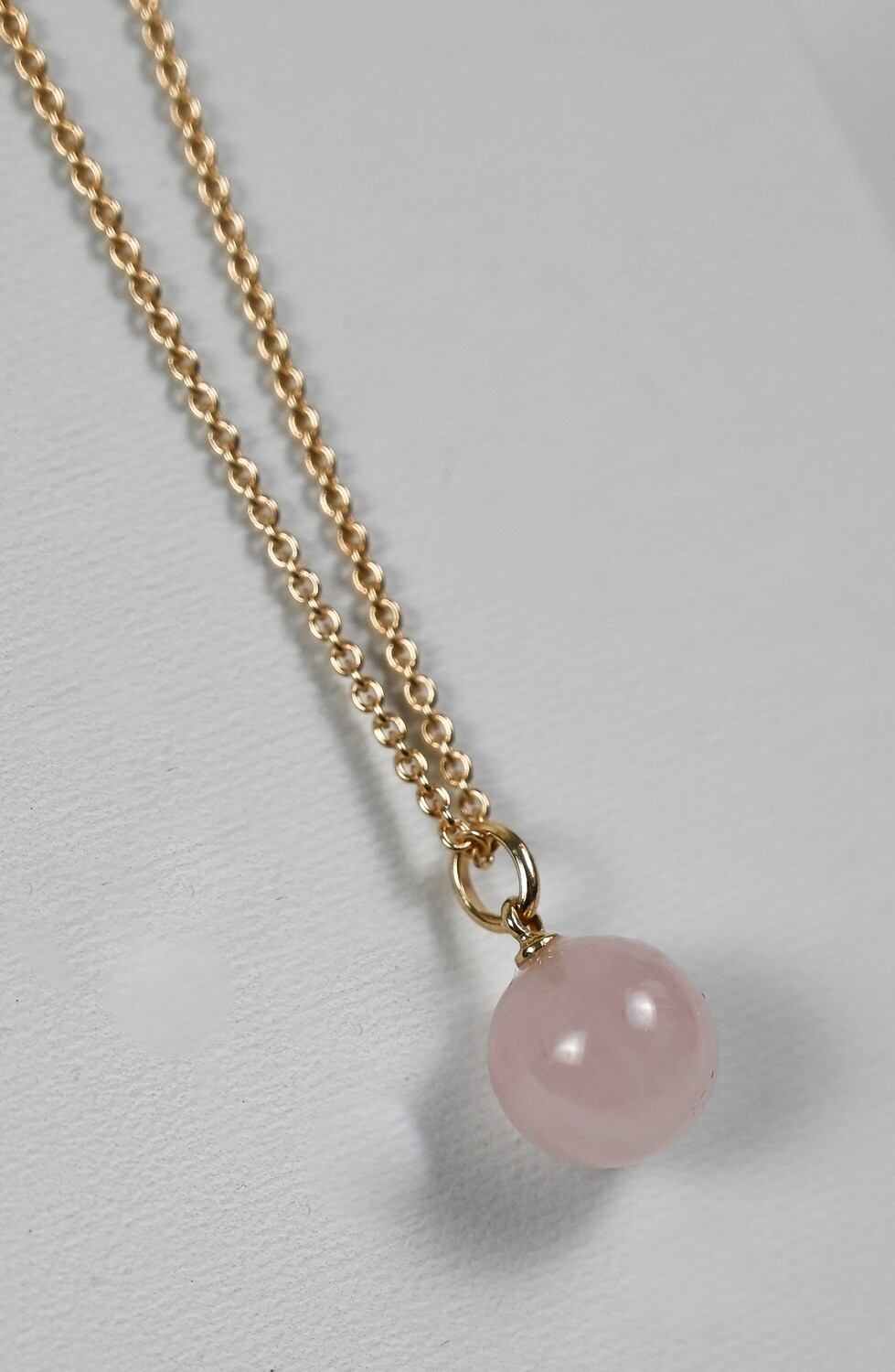 GOLDEN DROPS pendant, made of yellow 14 ct. gold and 8,0 mm. pink moonstone. Handmade by Helle Hennie