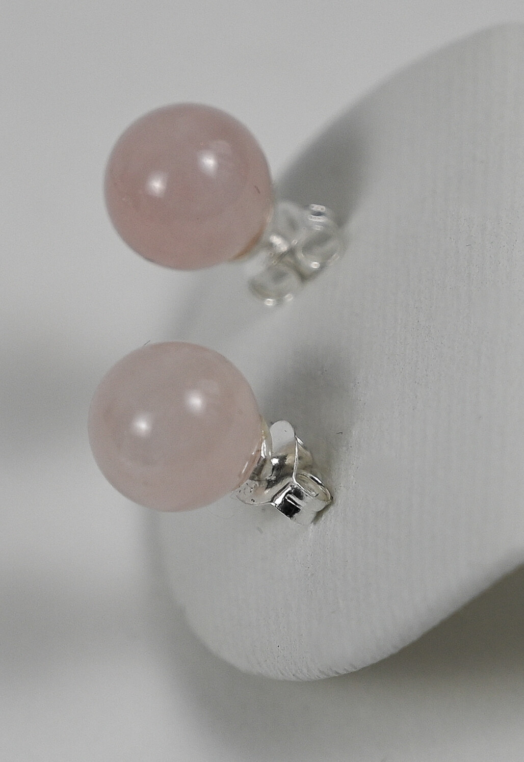 DROPS earrings, made of 925 sterling silver and pink moonstones. Handmade by Helle Hennie