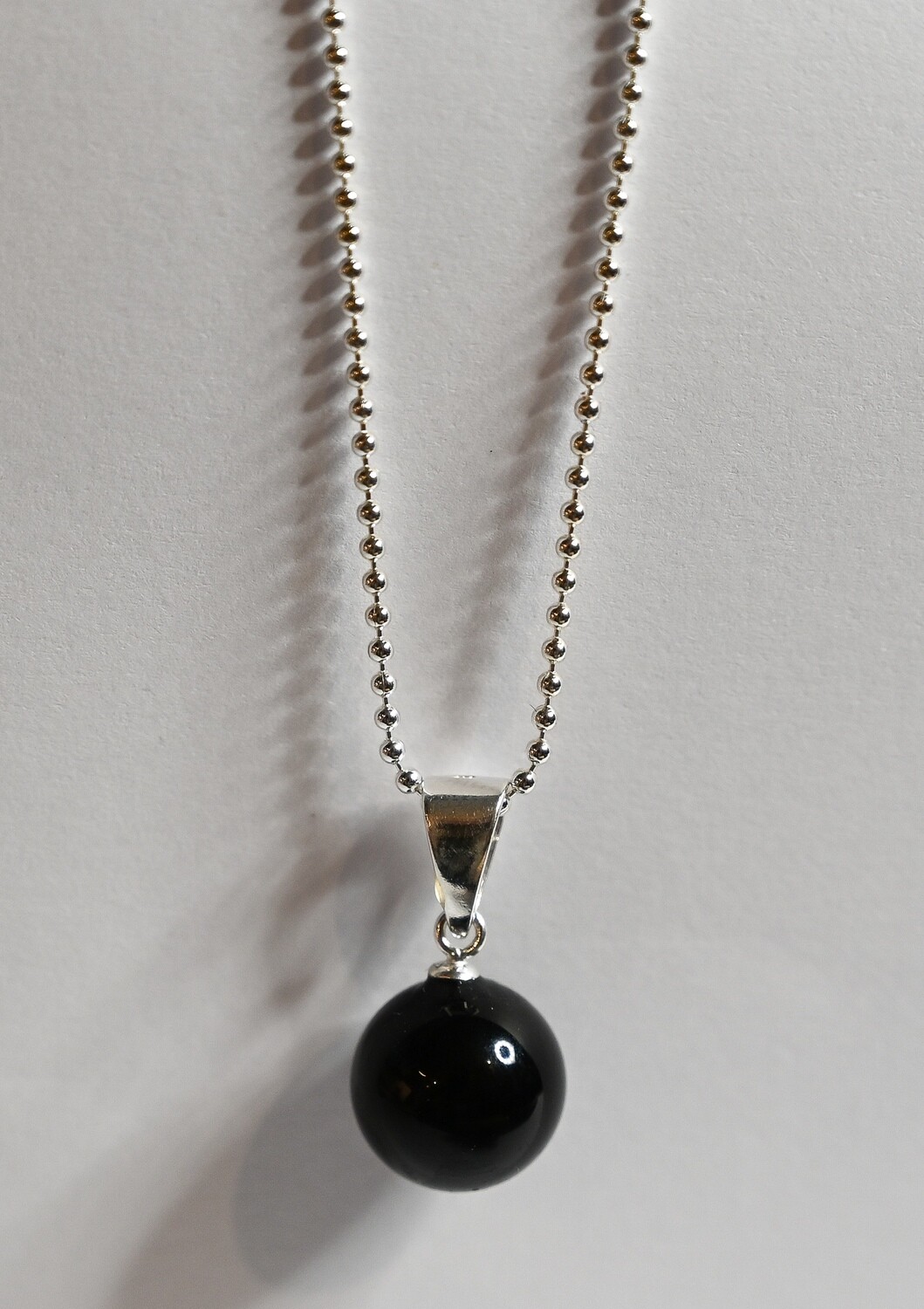 DROPS necklace, made of 925 sterling silver bead chain and pendant of black onyx 10 mm. Handmade by Helle Hennie