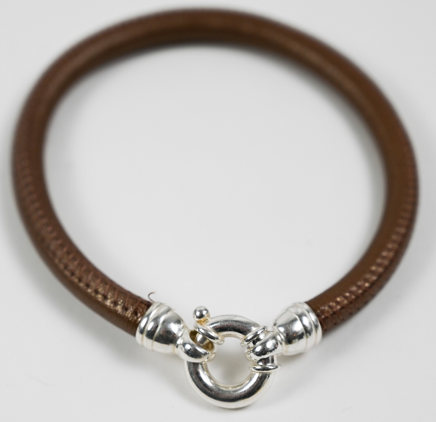 DAPPER bracelet, made of 925 sterling silver and 6,0 mm. brown stitched soft lambskin. 22 cm. Handmade by Helle Hennie