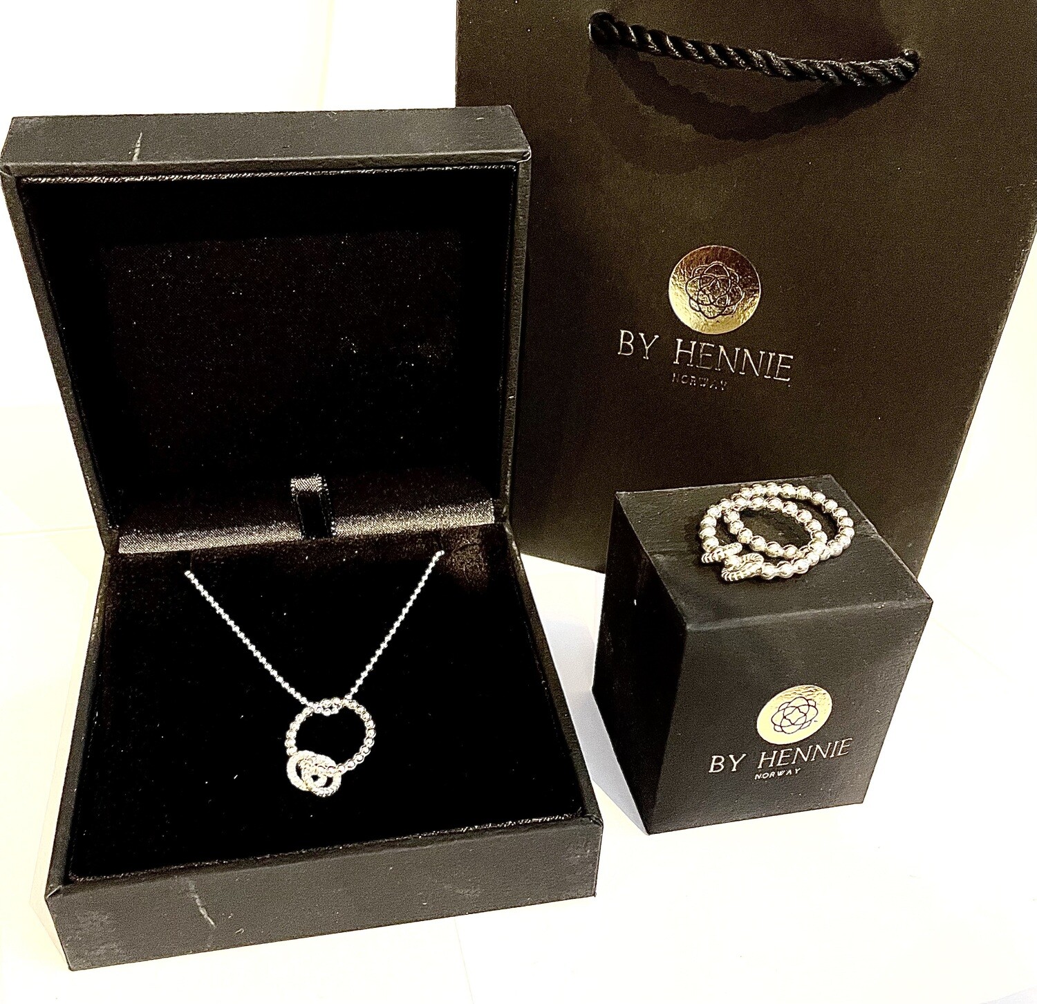 ATTACHED 2 pendant on bead chain, made of 925 sterling silver. Handmade by Helle Hennie​