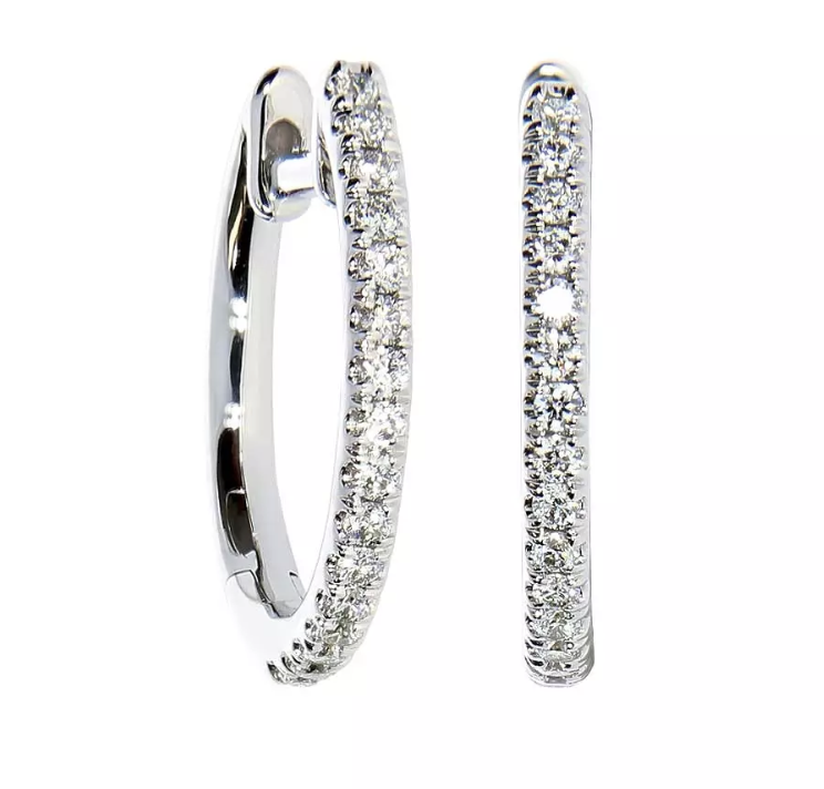 FORTUNA diamond earrings, made of 14 ct. white gold and 0,16 ct. W/SI diamonds. 14,4 x 1,4 mm.