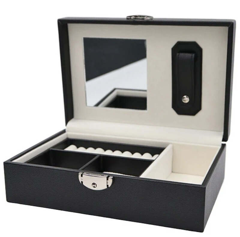 JEWELRY BOX 902
Made of black PVC and off white velvet inside. Comes with lock and key. 
W 245 x D160 x H78 mm.