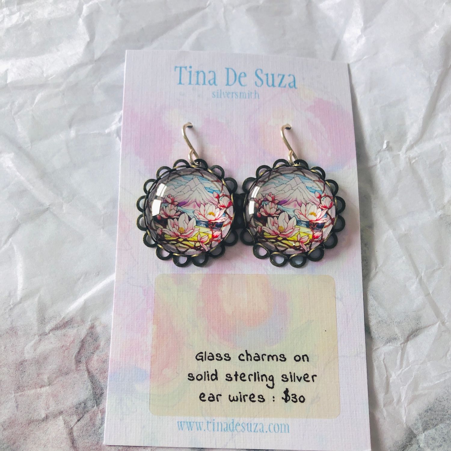 Earrings: Glass with metal frame