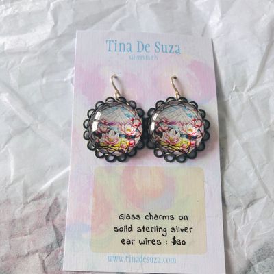 Earrings: Glass with metal frame