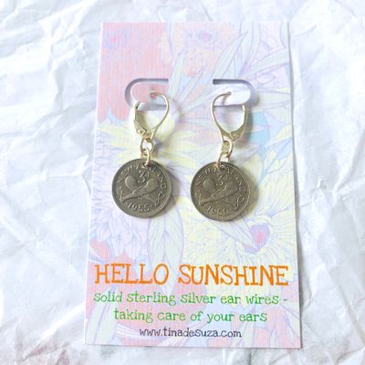 Old threepence coins on sterling