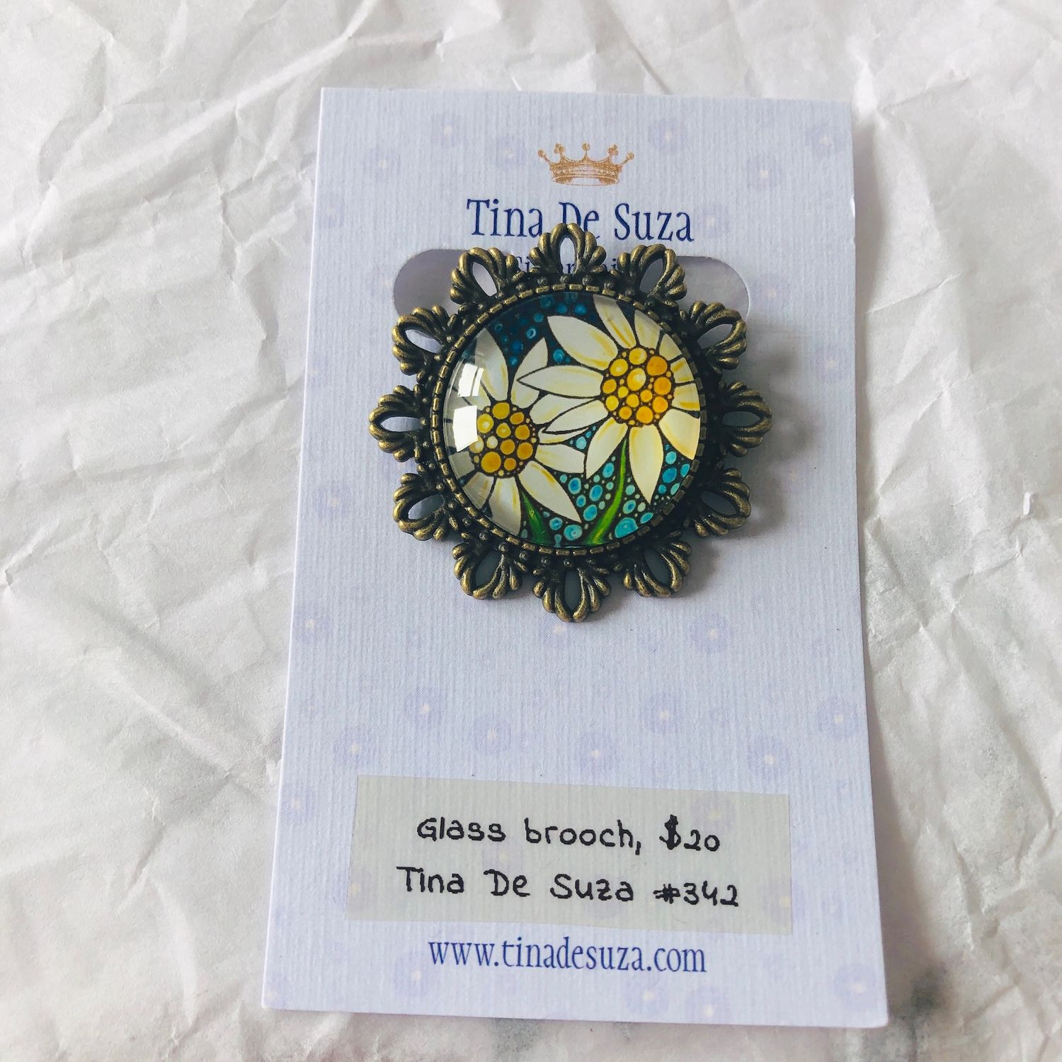 Brooch: Glass with metal frame