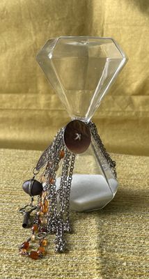 Assemblaged Art Using Modern Hourglass with Vintage Chains Jewelry and a Button