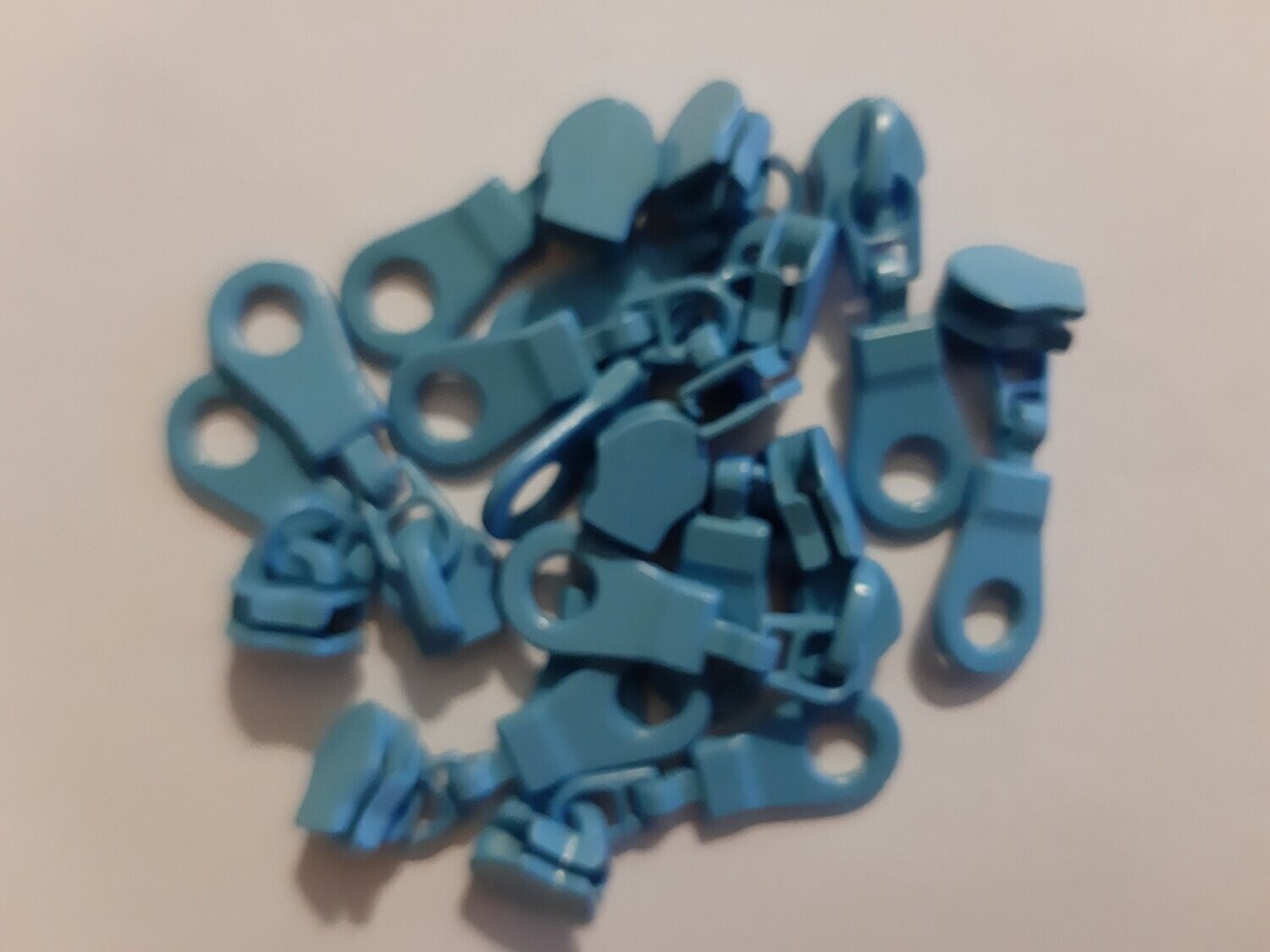 Curseur Turquoise maille 5 (vendu à l'unité)