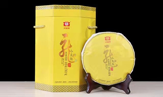 ​2018 Dayi Xiao Long Zhu (Dragon Pillar) ripe Shou puer tea cake 357g