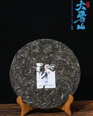 2022 Xiaguan Mengku Da Xue Shan ( Big Snow Mountain), aged old tree raw puerh, Tie Bing Iron cake, 357g sheng cha. 8 years aged raw material