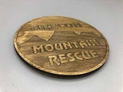 Round Wooden Coaster with etched badge