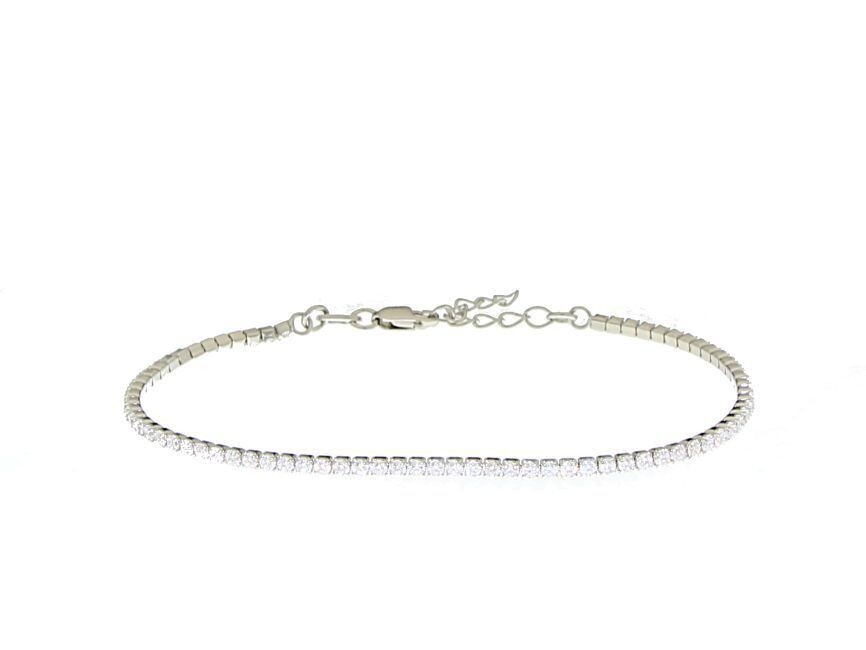Bracciale tennis arg 925 c/zirconi bianchi 4 griffe 1,5 mm. Cm 16+3