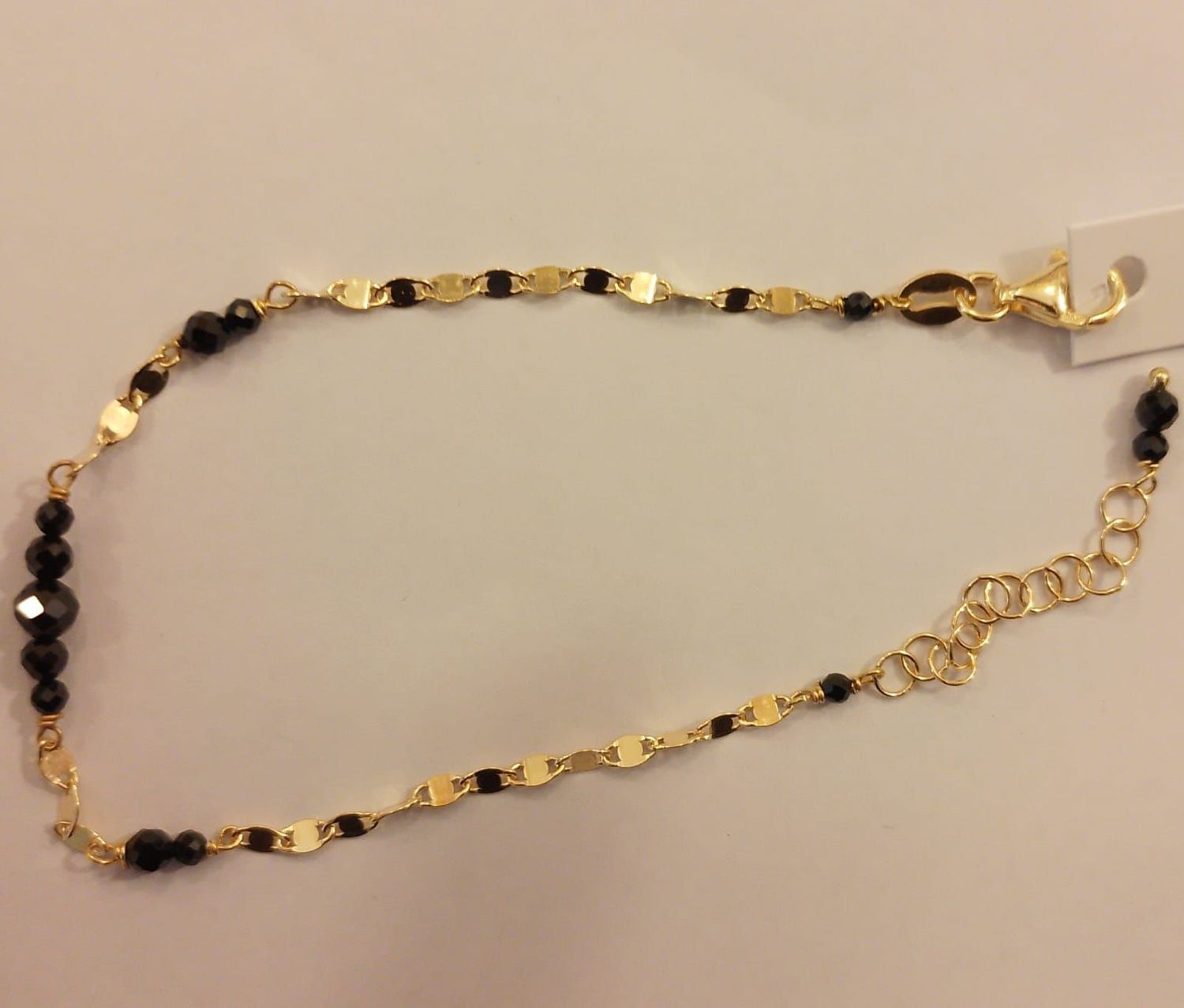 Bracciale in argento 925 placcato oro c/pietra dura spinello nero. Cm 16+4