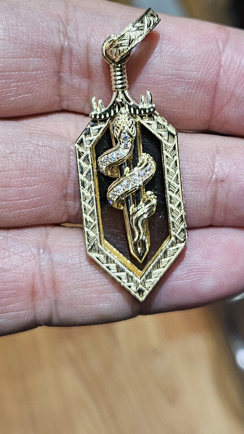 14K 2.1" SHIELD SNAKE/SWORD PENDANT, 14K 2.1" SNAKE/SWORD PENDANT: 14K 2.1" SHIELD SNAKE/SWORD PENDANT W/CZ APPROX. 8.6 GRAMS