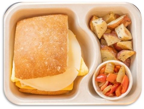 Three Cheese Egg Ciabatta w/ Breakfast Potatoes, Peppers & Onions