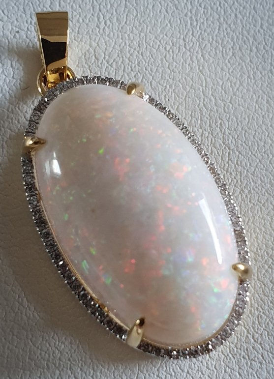 P4  Solid White Opal Pendant Surrounded by 58 Diamonds in 9ct Gold Mount