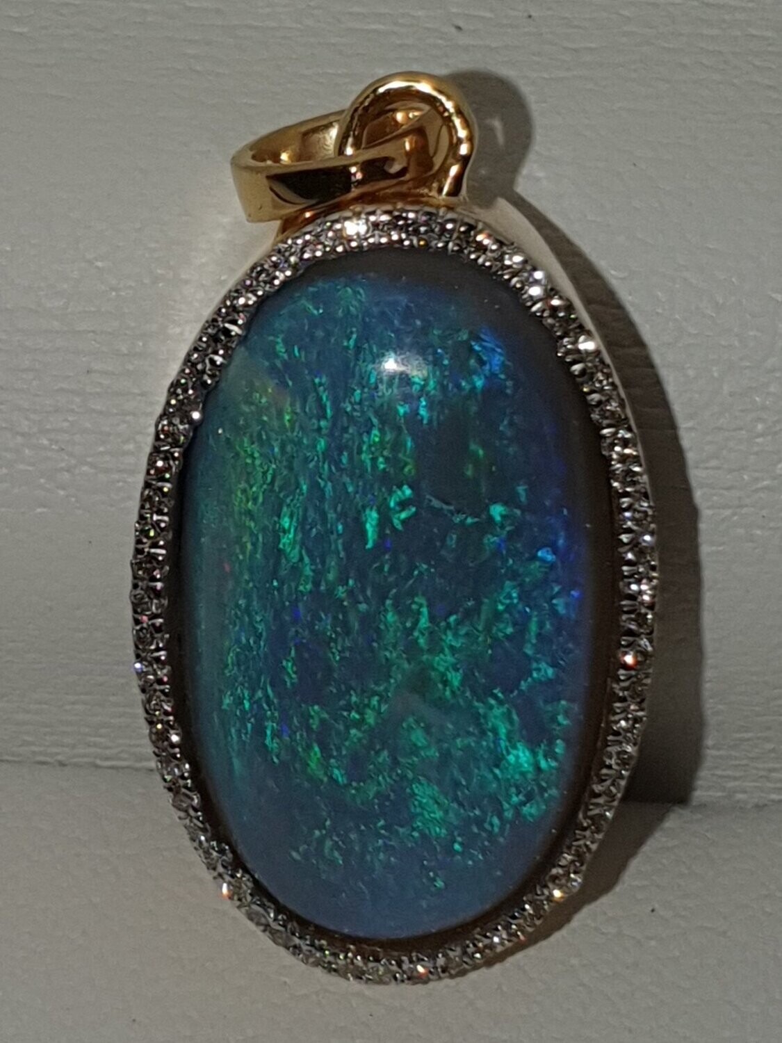 P1  Lightning Ridge Black Opal Pendant With Diamond Surround