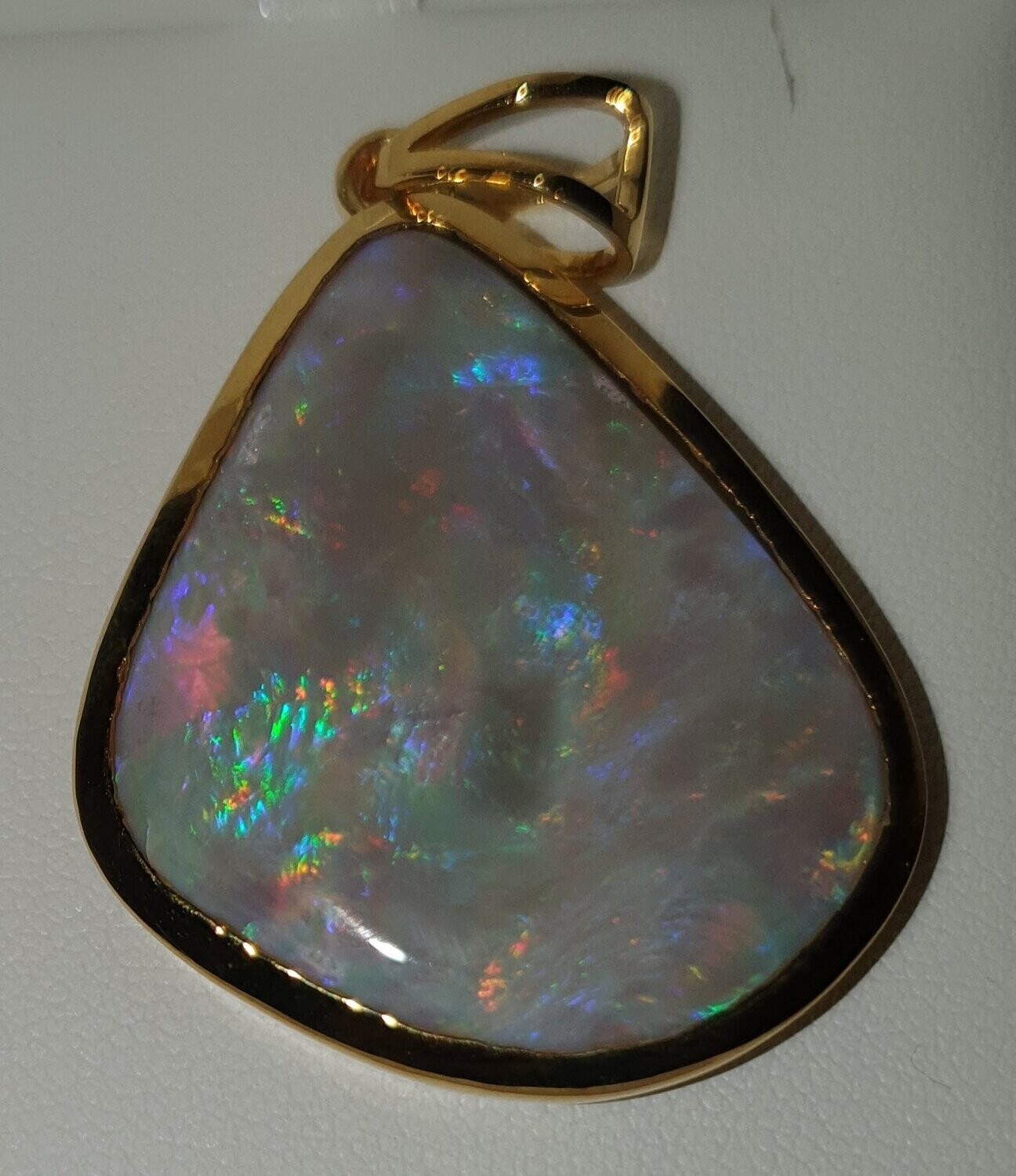 P3  Solid Opal Dark Base Pendant Freeform Shape Set in 9ct Gold