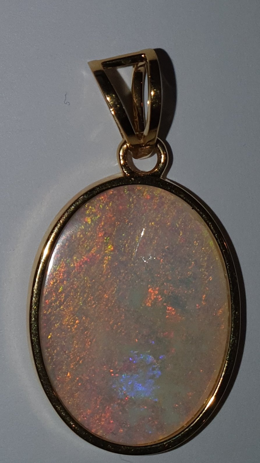 P2  Large Solid White Opal Pendant in 9ct Frame