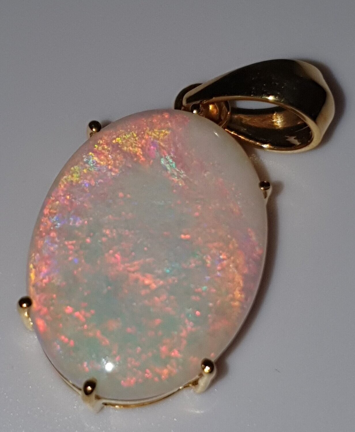 P5  Large Solid White Opal Pendant Claw Set in 9ct Gold