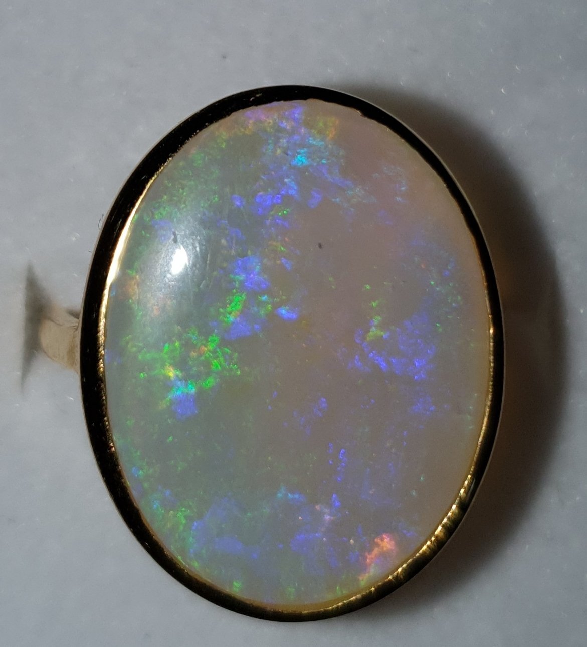 R16  Oval Cabochon Crystal Solid Opal Ring With Predominant Purple & Green, Semi Translucent, Set in 9ct Yellow Gold