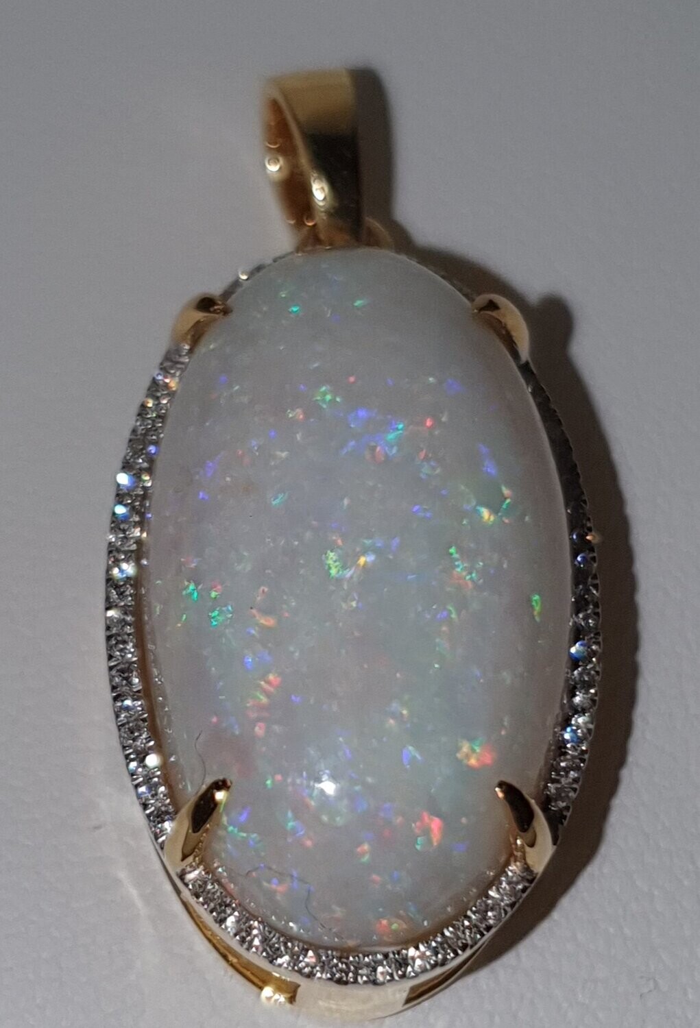 P4  Solid White Opal Pendant Surrounded by 58 Diamonds in 9ct Gold Mount