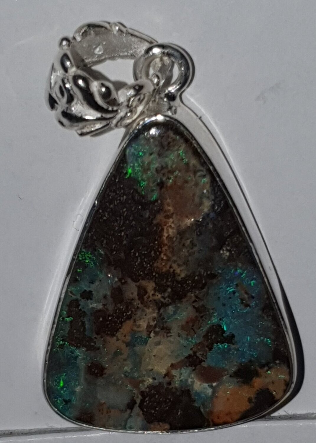 P26  Sterling Silver Set Boulder Opal Pendant, 20 X 27mm With Blue & Green Flash Sitting on Ironstone Host