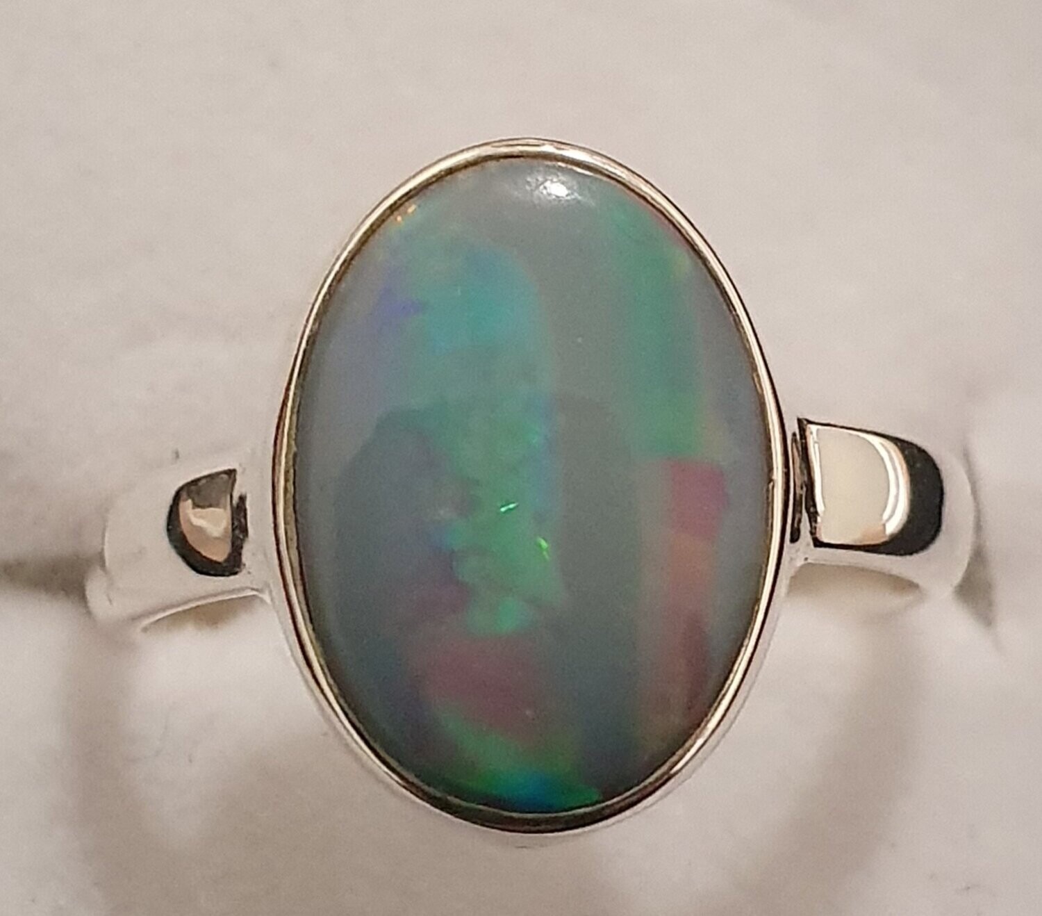 R23a  Sterling Silver Set crystal  Opal doublet, 8 X 12mm Across Face, With Rolling Red, blue & Green Flash