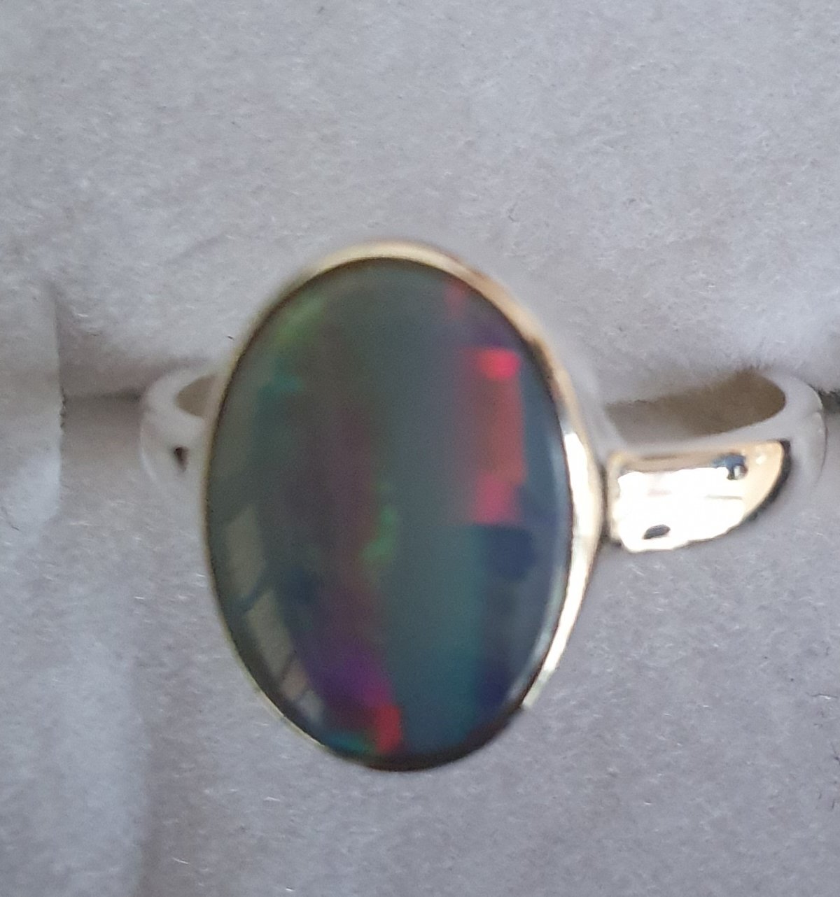 R23a  Sterling Silver Set crystal  Opal doublet, 8 X 12mm Across Face, With Rolling Red, blue & Green Flash
