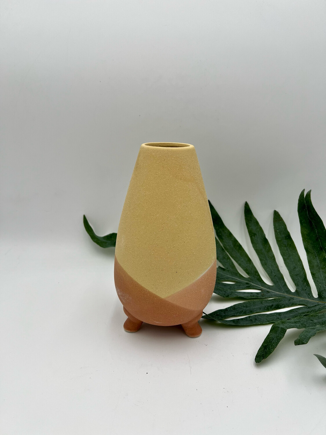 WARM COLORS THREE LEGGED VASE 8" H