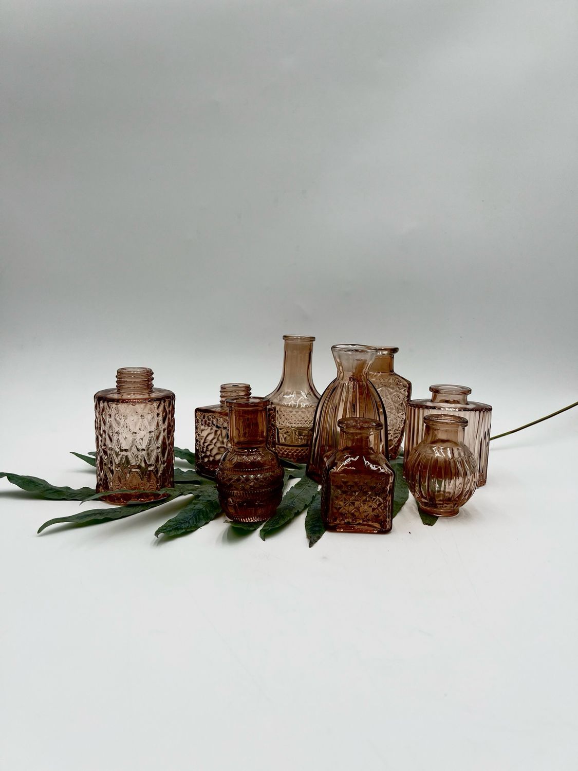 AMBER BUD VASE ASSORTED DESIGN 3-4" H