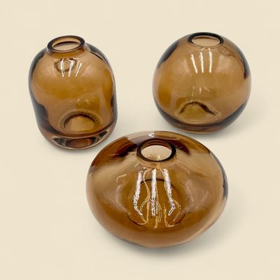 TINTED DARK AMBER BUD VASE ASSORTED TINTED DARK AMBER BUD VASE ASSORTED