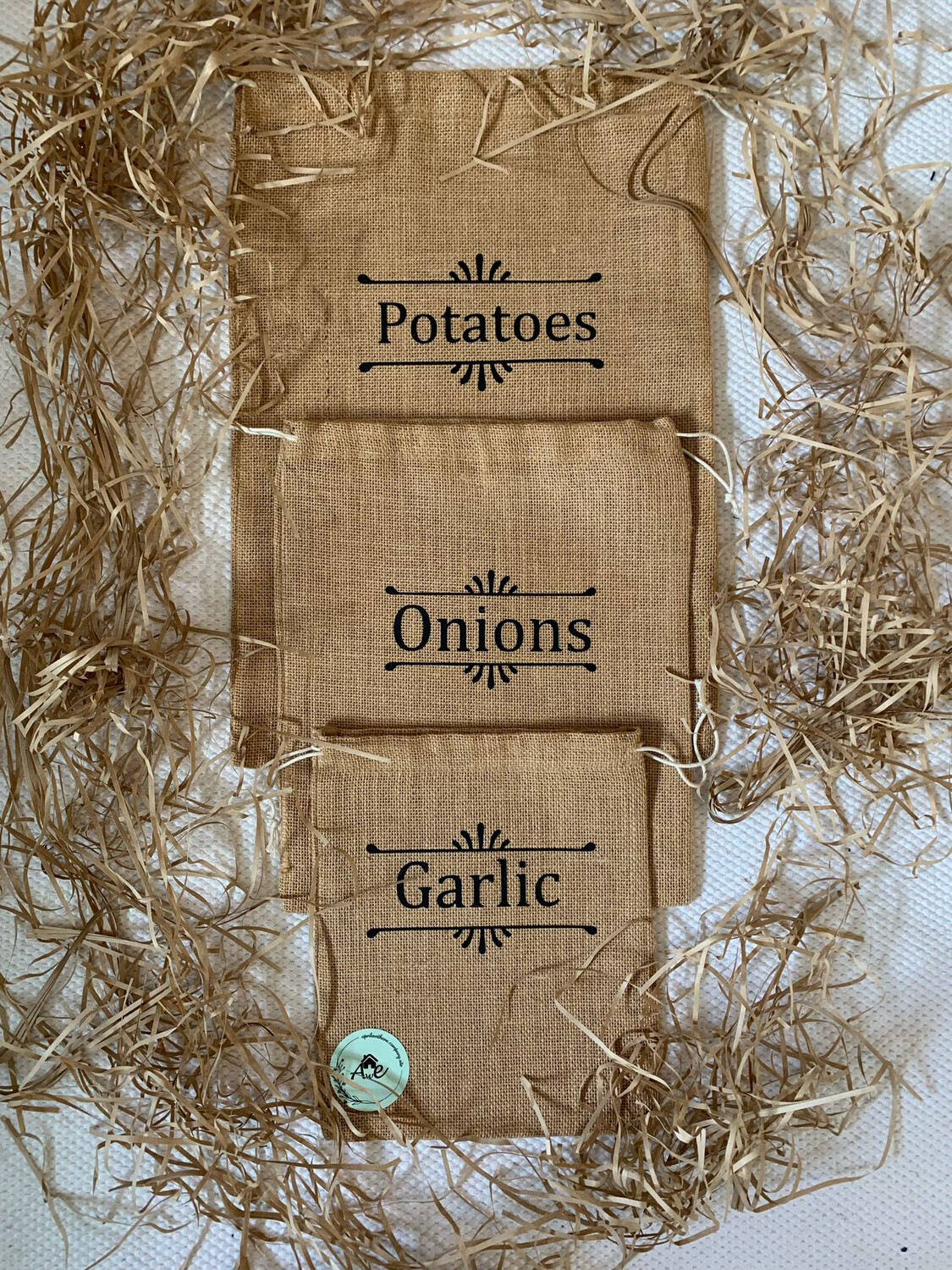 Set of three Potato, Onion, Garlic Hessian bags.