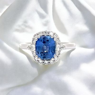 18ct White Gold Cushion Cut Ceylon Sapphire & Diamond Halo Ring