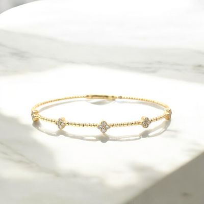 14k Gold Clover Diamond Set Flexi Bracelet.