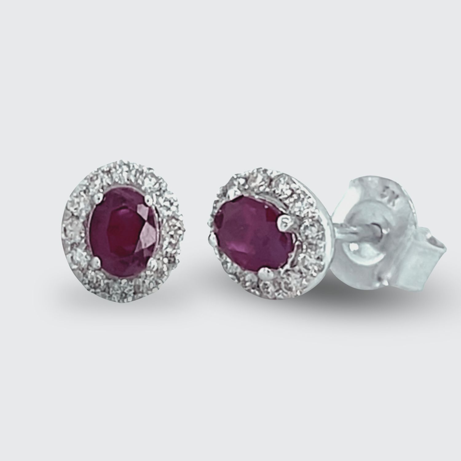 9W Oval Ruby & Diamond Halo Earrings