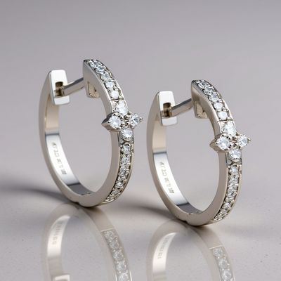 9W Diamond Huggie Earrings TDW 0.14cts 9W Diamond Huggie Earrings TDW 0.14cts