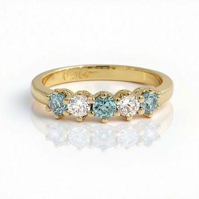 18ct Gold Aquamarine & Diamond Anniversary Ring 18ct Gold Aquamarine & Diamond Anniversary Ring