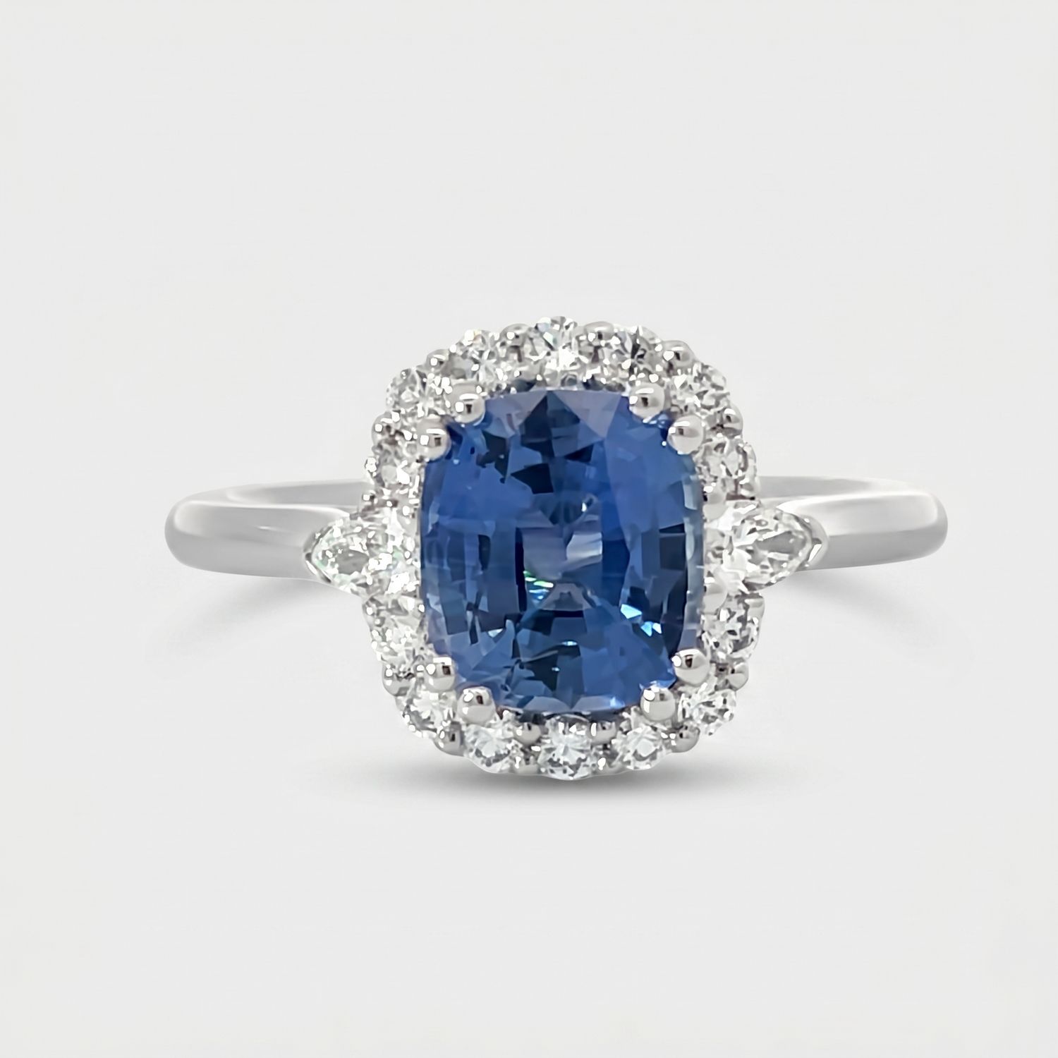 18W Gold Cushion Cut Ceylon Sapphire & Diamond Halo Ring