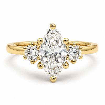 18ct Marquise & Round Trilogy Diamond Ring 18ct Marquise & Round Trilogy Diamond Ring