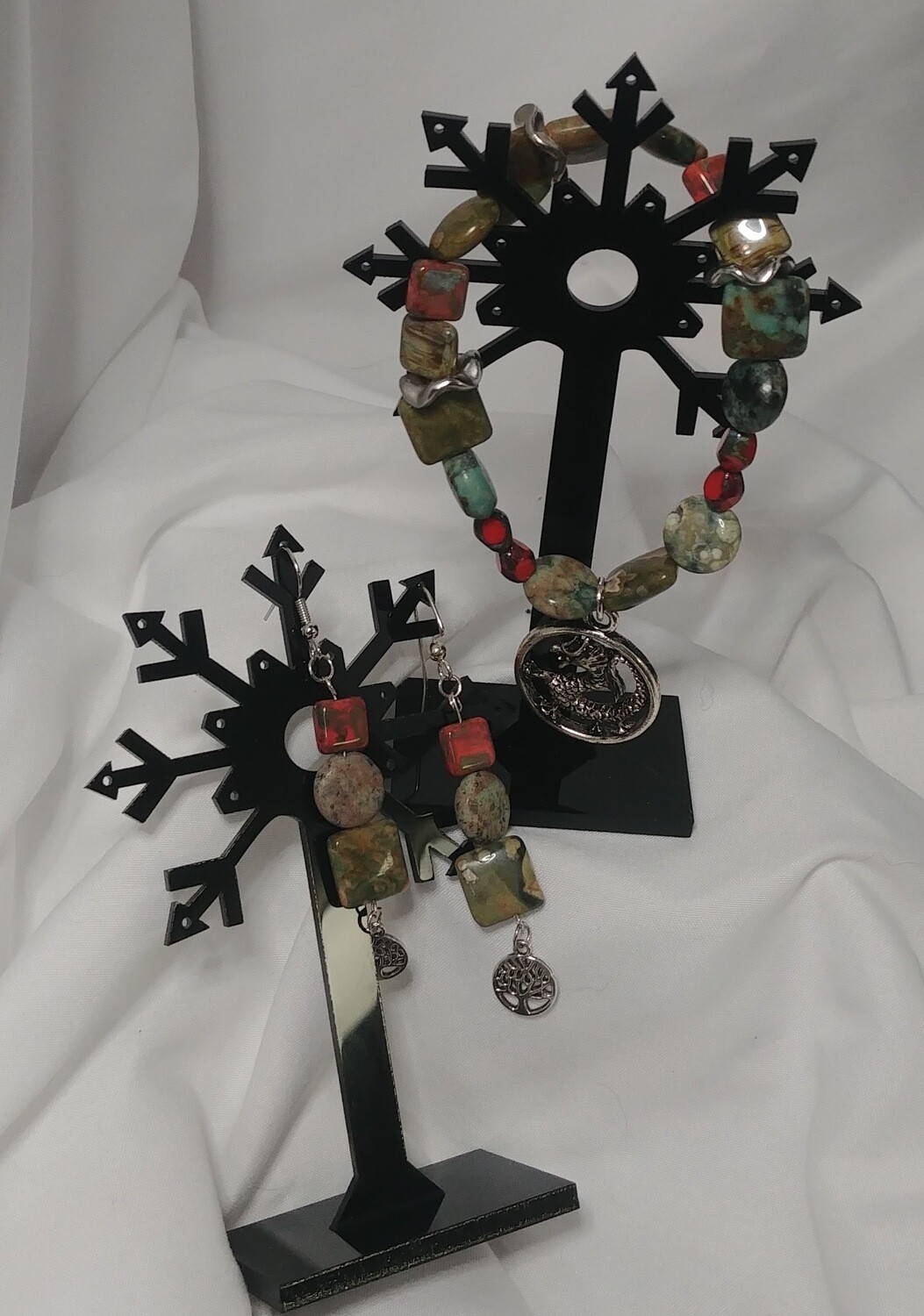 Beautiful green stone Dragon bracelet with matching Tree of Life earrings.