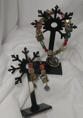 Beautiful green stone Dragon bracelet with matching Tree of Life earrings.