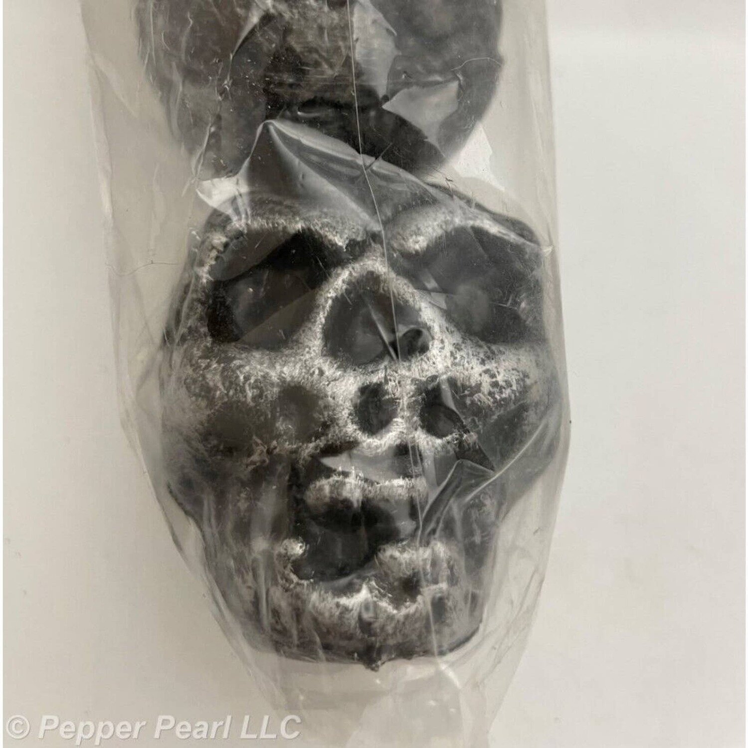 Three Plastic Skulls Halloween Décor Novelty 3 Inches